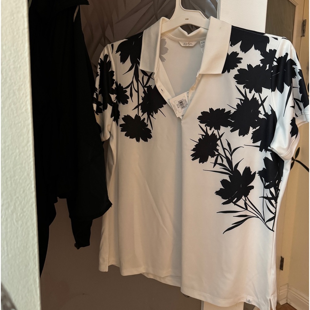 Call Lady Hansen white background with black floral golf shirt